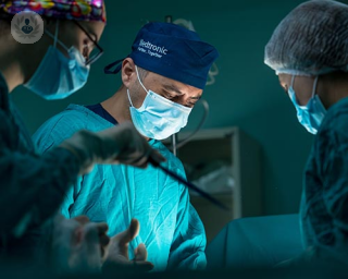 3 surgeons in the operating room