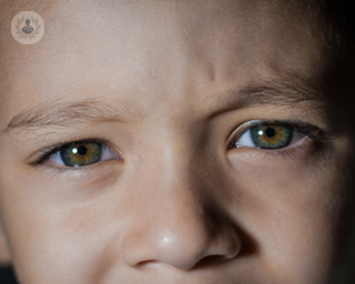 Close up of a young boy's hazel eyes
