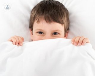 young child in bed