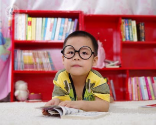 A child wearing glasses