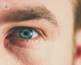Up close shot of a man with blue eyes