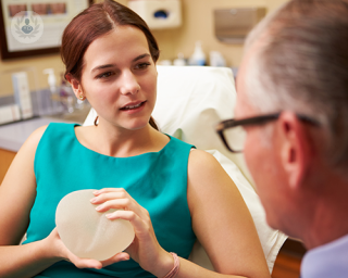 Patient and doctor discuss breast implants