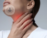 Woman holding her sore throat