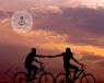 People leisurely cycling at sunset