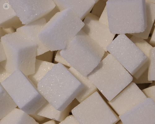 Sugar cubes, which are a contributor to raised glucose levels and could require continuous glucose monitoring (CGM).