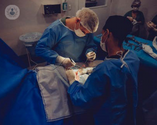 an image of surgeons preparing surgery