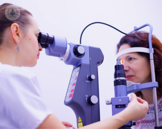 A picture of a woman having an eye exam 