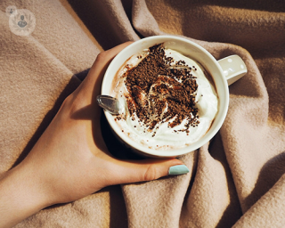 hands holding a hot chocolate drink