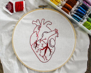 A picture of a heart that has been embroidered
