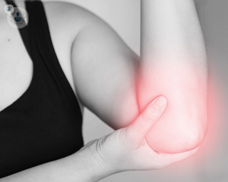 Can an elbow replacement restore full function to the joint?