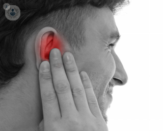 A man with ear buzzing and ringing. 