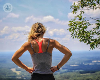 Woman hiking to maintain heart health