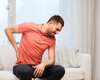 Man with lower back pain due to kidneys