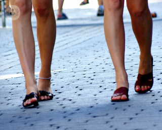 ladies legs walking down the street