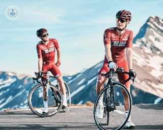 Two professional cyclists on a mountain