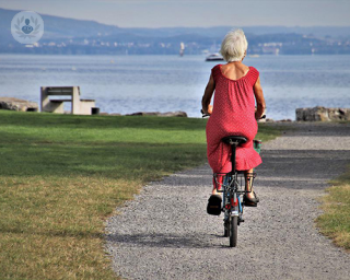 An older woman on her bike