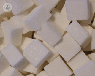 Sugar cubes, which are a contributor to raised glucose levels and could require continuous glucose monitoring 