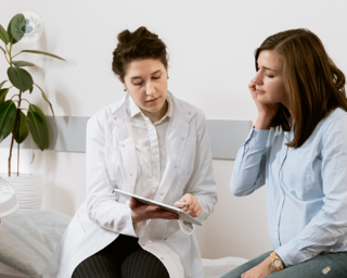 Woman having a neuro-oncology consultation
