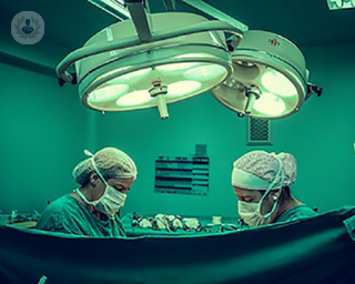 an image of surgeons preparing surgery