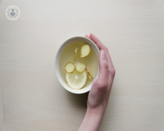 Cup of lemon and ginger water