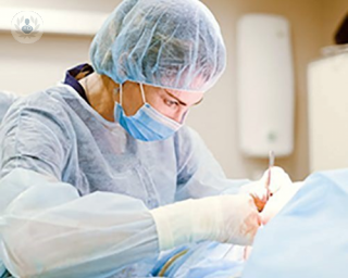an image of a surgeon operating