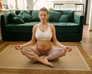 A pregnant woman meditating