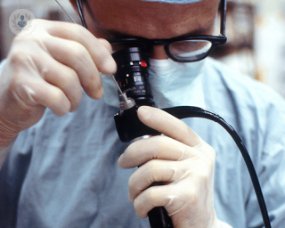 Surgeon looking through a gastroscopy camera