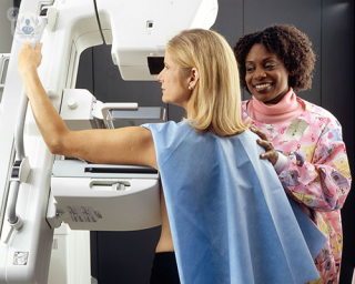 A woman undergoing breast screening. 