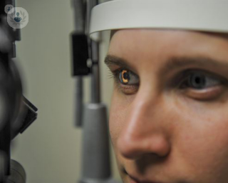 A woman undergoing a comprehensive eye examination. 