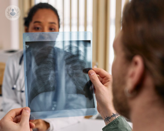 examining a chest x-ray