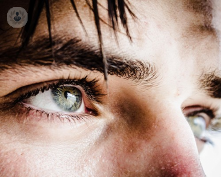 Man with blue green eyes 