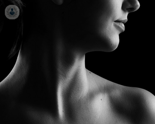 a woman's neck and shoulder