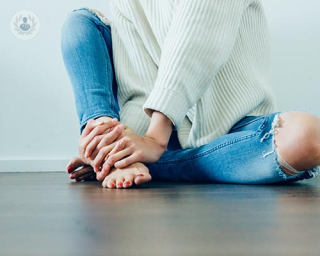 Woman with ripped jeans 