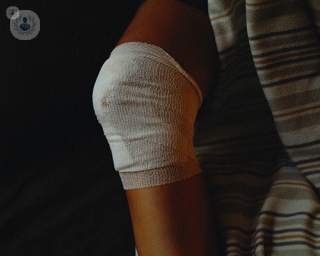 A bandaged knee. 
