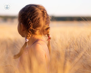 A little girl in a field 