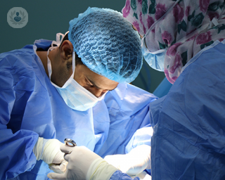 Surgeons operating on pharyngeal pouch