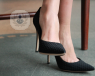 Close up shot of woman's feet wearing heels
