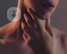 A picture of a woman touching her throat