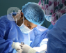 Surgeon performing robot-assisted surgery