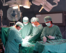 doctors performing surgery in theatre