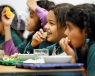 children eating school dinner