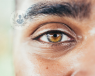 Close up of a young man's hazel eye