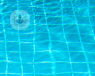 A picture of pool tiles refracting underwater 