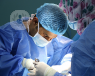 Surgeon performs surgery