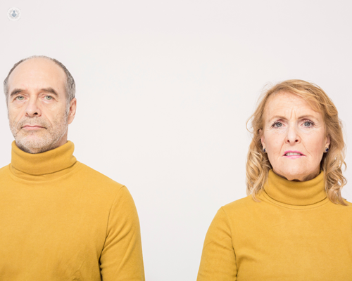 Man and woman with serious expressions - both affected by lichen sclerosis