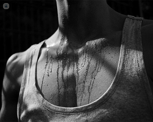 Increased sweating caused by an overactive thyroid