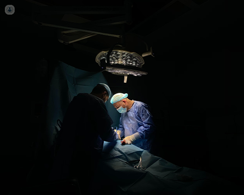 Surgeons undertaking a laparoscopic pancreatic surgery procedure