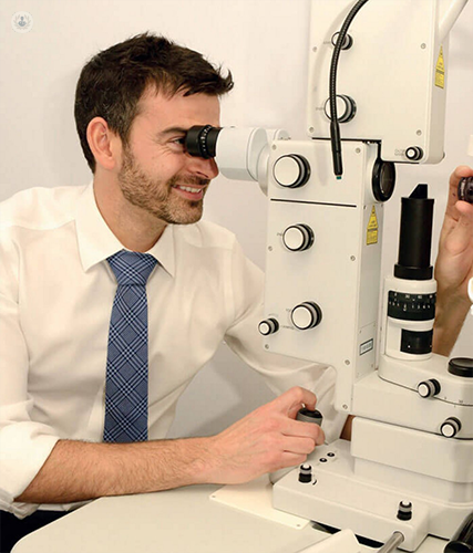 Mr Dan Lindfield wih eye examining equipment