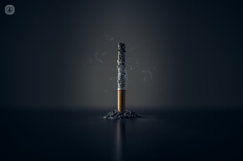A smoking cigarette, which can cause addiction
