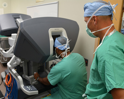 Surgeon performing robotic spinal surgery